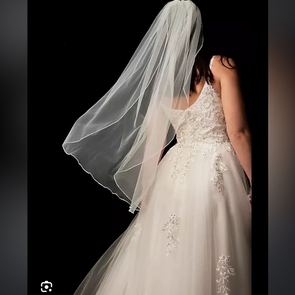 Blush fingertip veil